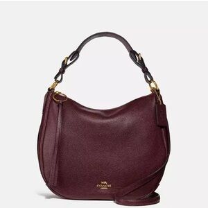 Gorgeous COACH Sutton hobo pebble leather bag. Oxblood colorway